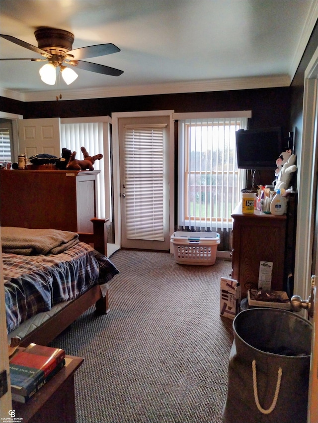 bedroom with ceiling fan, ornamental molding, and carpet