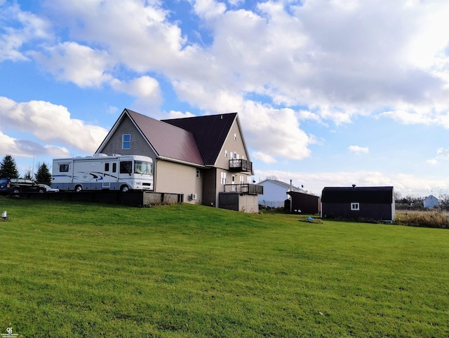 view of property exterior featuring a lawn