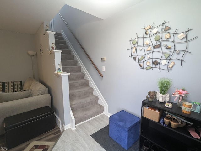 stairway featuring hardwood / wood-style flooring