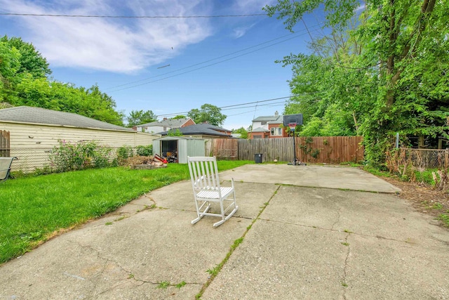 view of patio featuring a shed