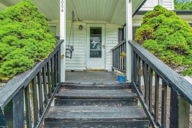 property entrance featuring covered porch