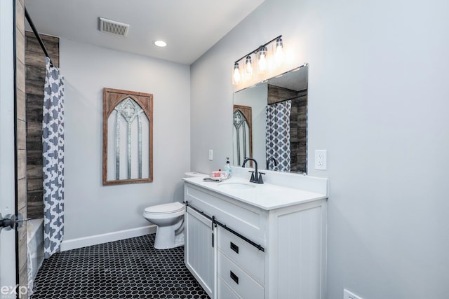 full bathroom with vanity, tile patterned floors, toilet, and shower / bathtub combination with curtain