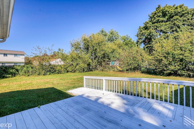 wooden deck with a yard