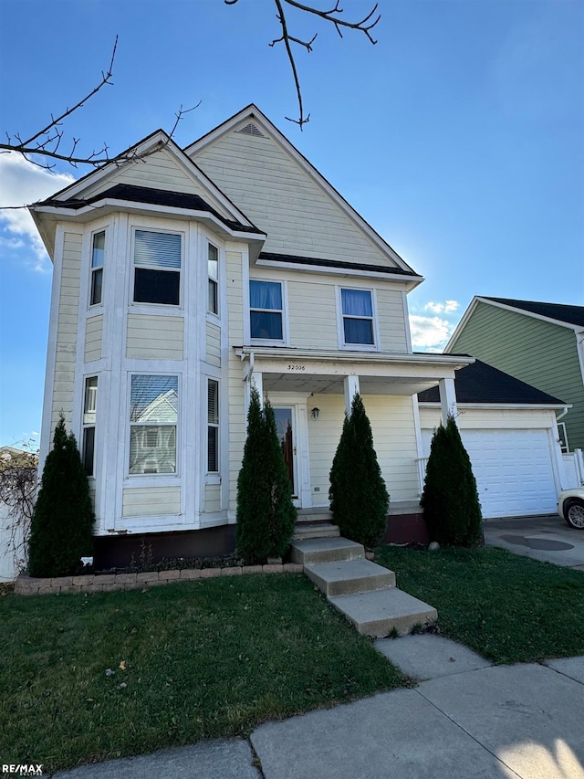 view of front of house featuring covered porch and a front yard