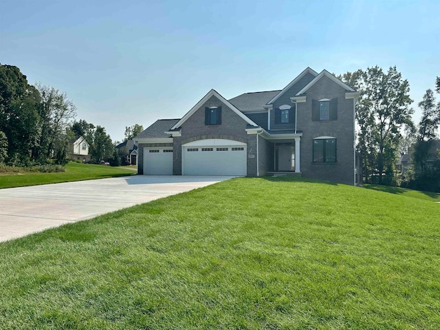 traditional-style home with an attached garage, concrete driveway, and a front lawn