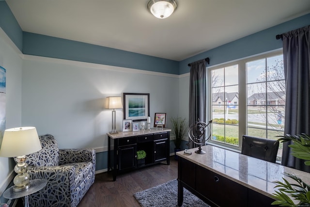 office with baseboards and dark wood-style flooring