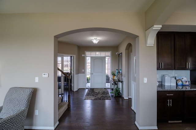 entryway featuring dark wood-type flooring