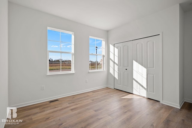 entryway with light hardwood / wood-style flooring