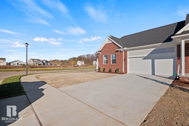 view of property exterior with a garage