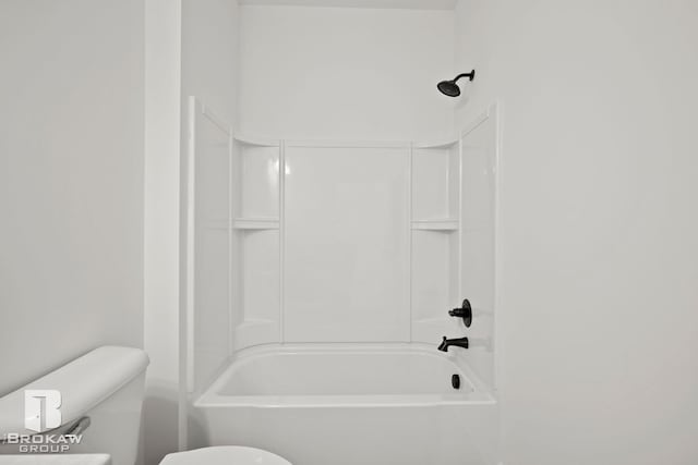 bathroom featuring toilet and shower / bathing tub combination