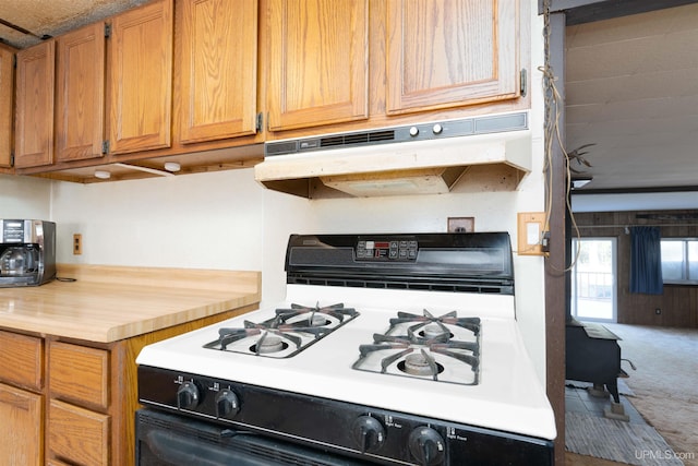 kitchen with white gas range