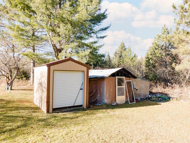 view of outdoor structure with a yard