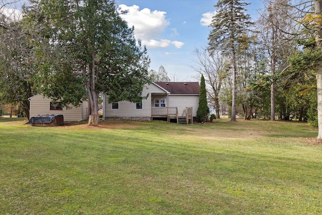 view of yard featuring a wooden deck