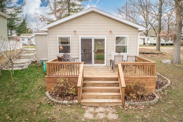 rear view of house with a deck