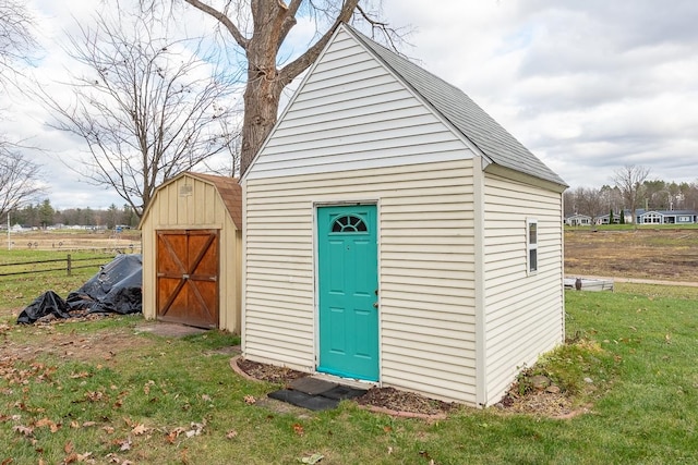 view of outdoor structure featuring a yard