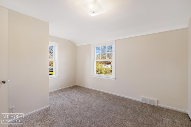 unfurnished room featuring carpet floors