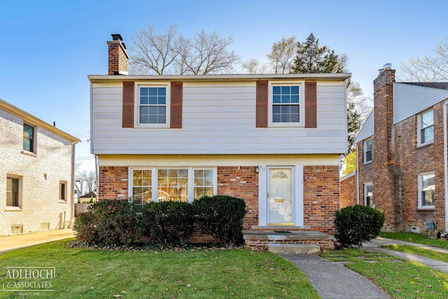 view of front of property with a front lawn