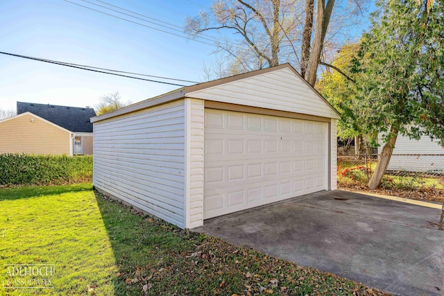 garage with a yard