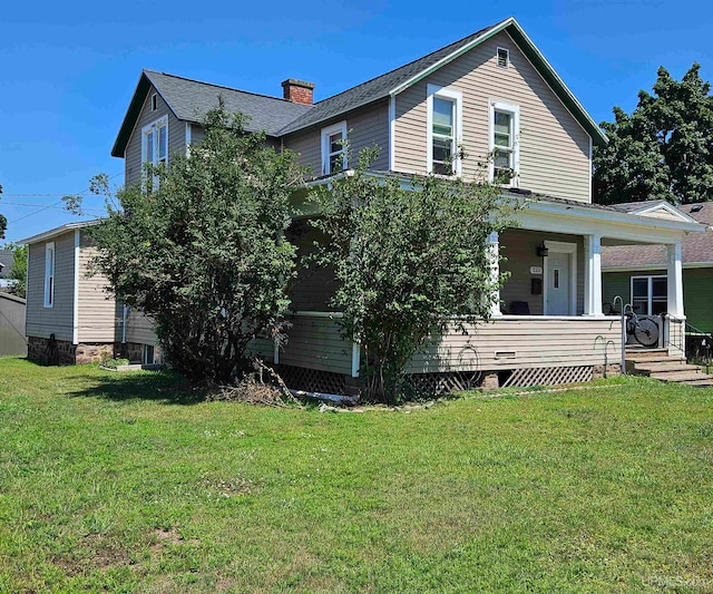 view of front of home with a front yard