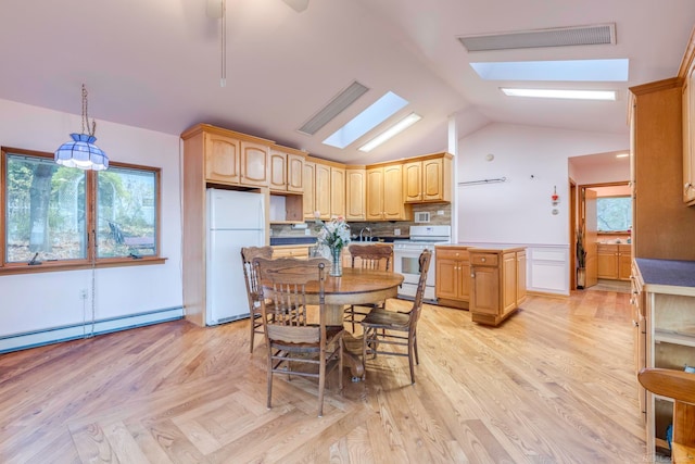 kitchen featuring light brown cabinets, white appliances, light hardwood / wood-style flooring, and vaulted ceiling with skylight