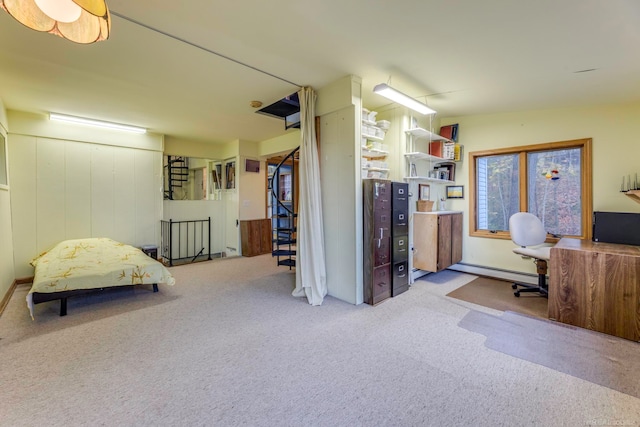 office area with light carpet and a baseboard radiator