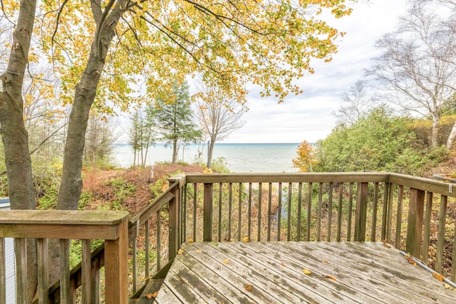 deck featuring a water view