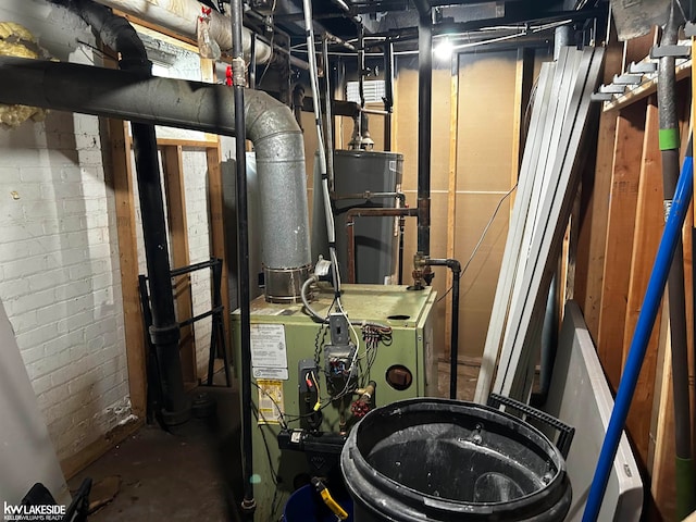 utility room featuring water heater