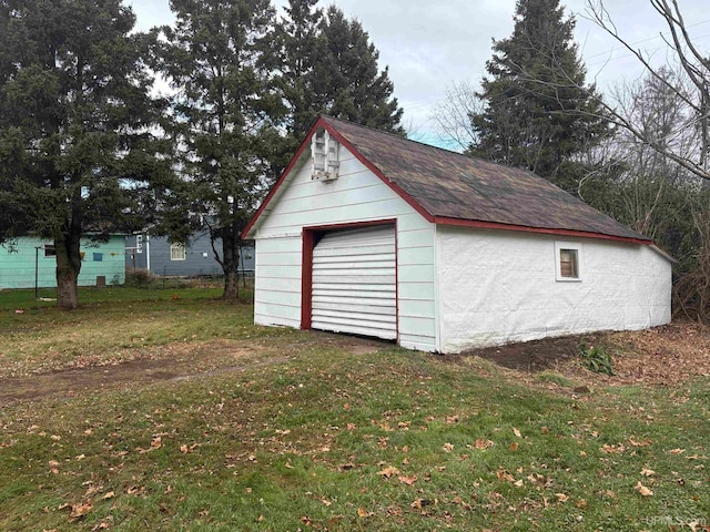 garage with a yard