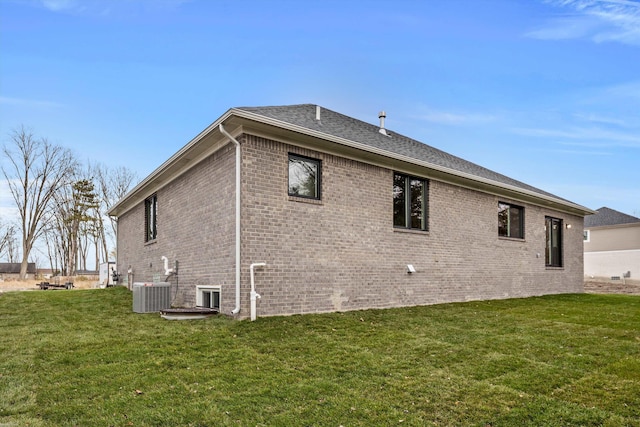 view of home's exterior featuring a lawn and cooling unit