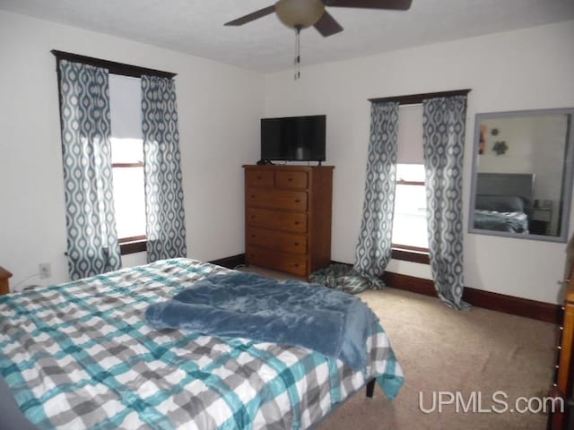 bedroom with carpet flooring and ceiling fan