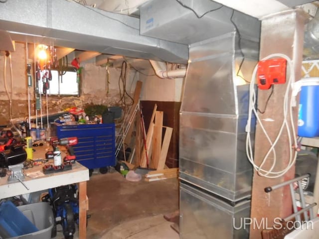 basement with a workshop area