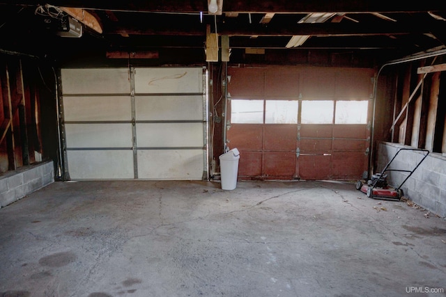 garage featuring a garage door opener