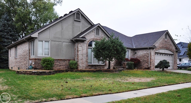 view of front of property with a garage and a front lawn