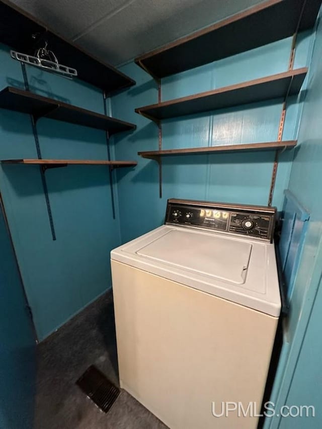 laundry room featuring washer / clothes dryer