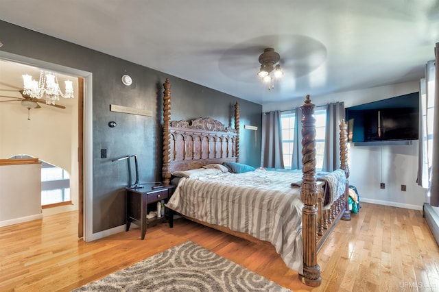 bedroom featuring hardwood / wood-style floors and ceiling fan