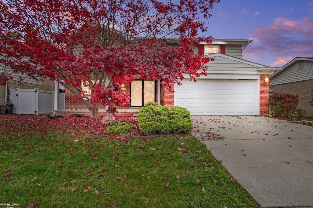 view of front of property featuring a garage