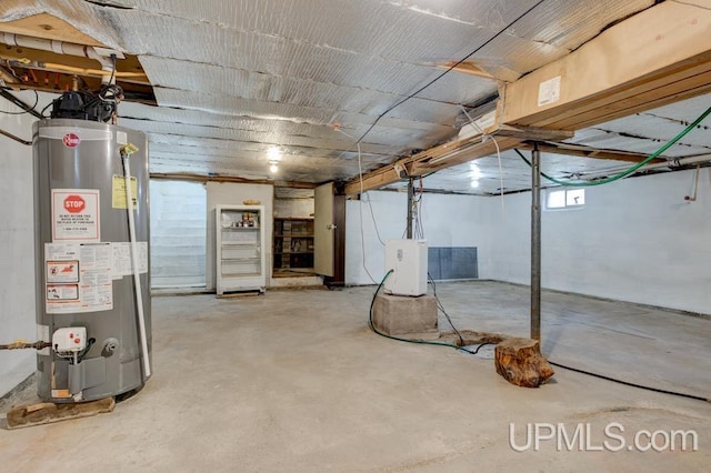 basement featuring gas water heater