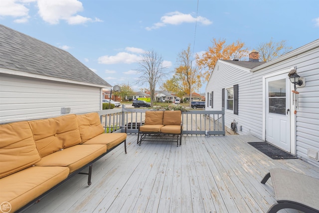 deck with an outdoor hangout area