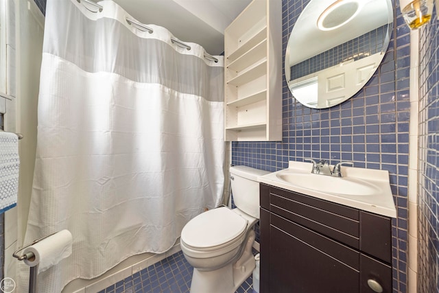 bathroom featuring vanity, backsplash, tile patterned flooring, toilet, and tile walls