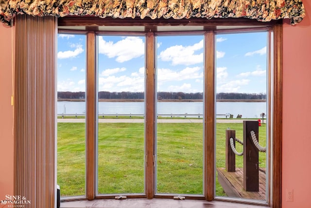 doorway featuring a water view