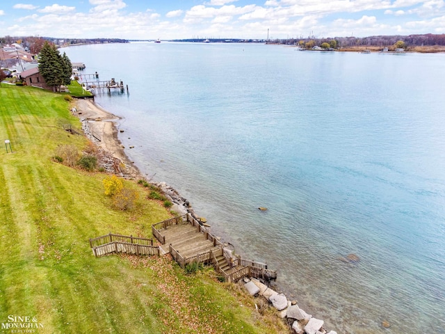 property view of water featuring a boat dock