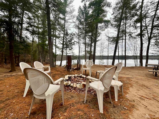 view of patio with a water view