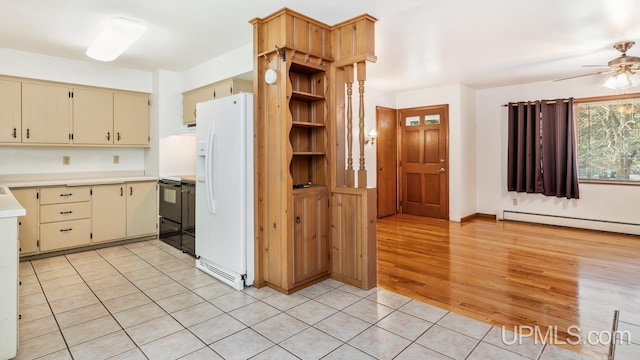 kitchen featuring cream cabinetry, ceiling fan, light wood-type flooring, and white fridge with ice dispenser