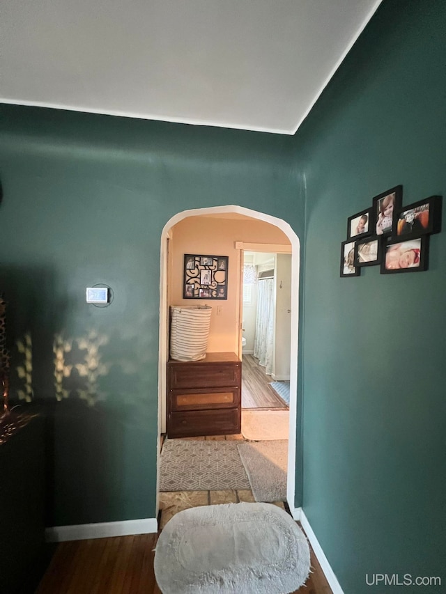 hallway featuring hardwood / wood-style floors