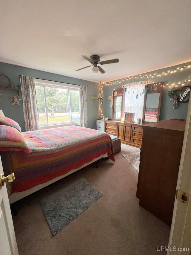 bedroom with carpet flooring and ceiling fan