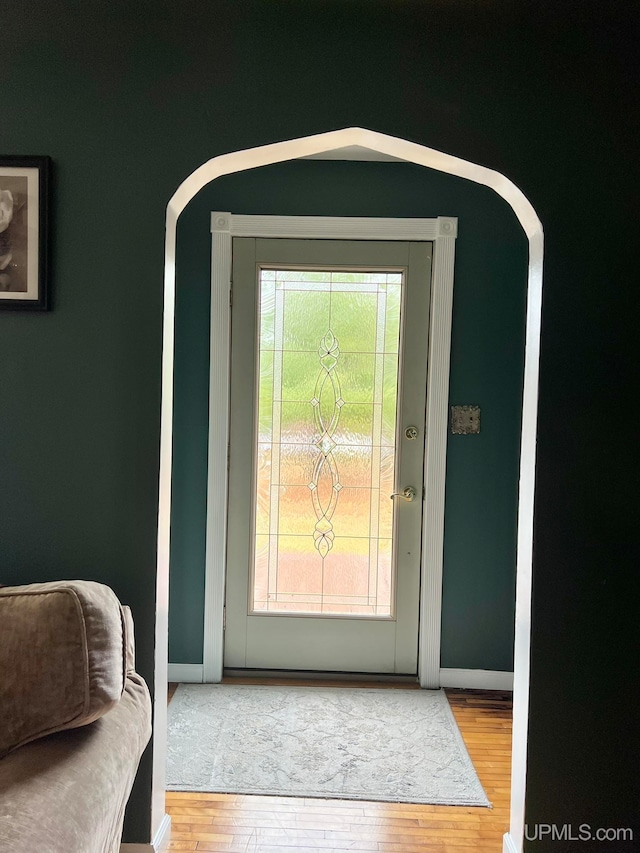 doorway featuring hardwood / wood-style floors