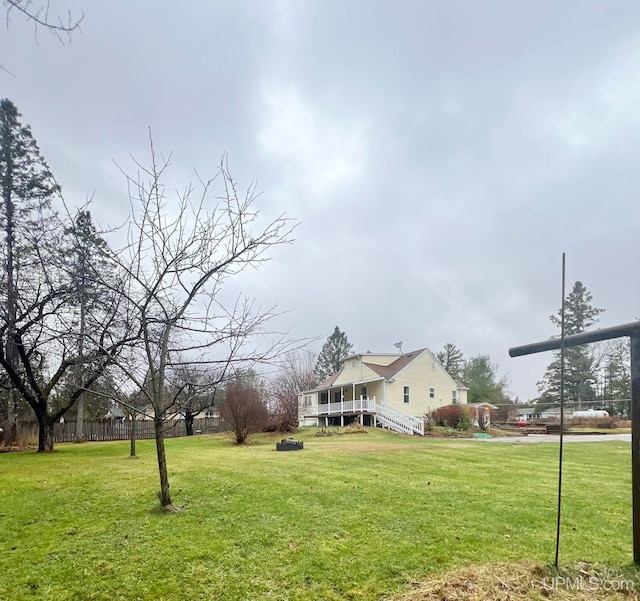 view of yard featuring a sunroom