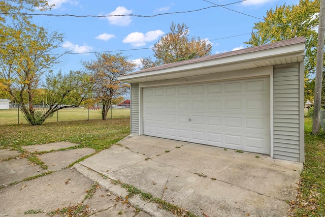 garage with a lawn