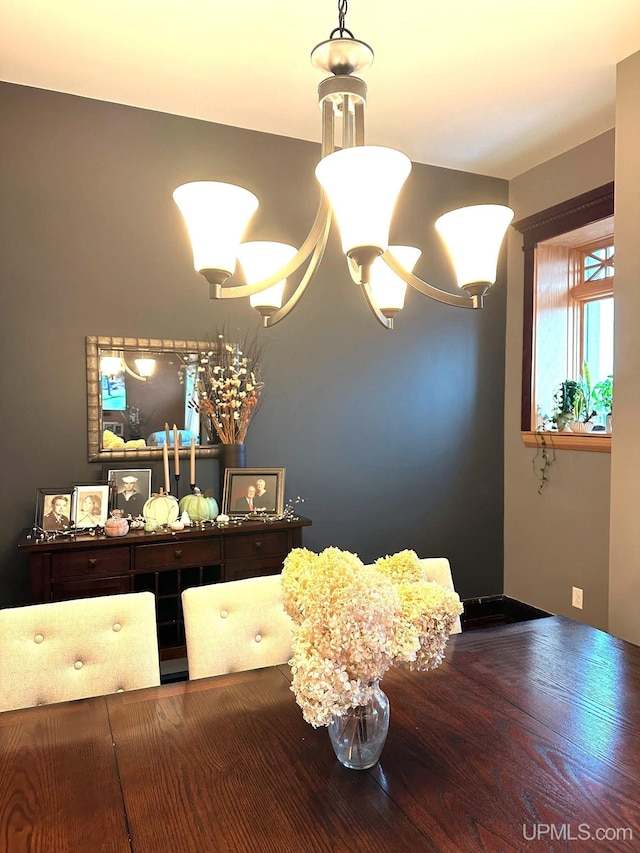 interior details with an inviting chandelier