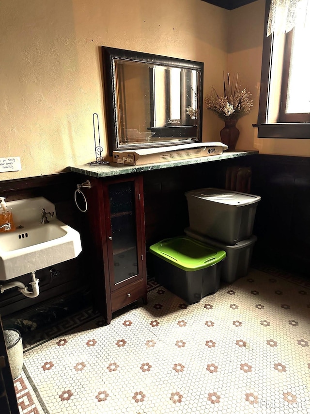 318 Iron St, Negaunee, MI 49866 - bathroom featuring a sink and toilet